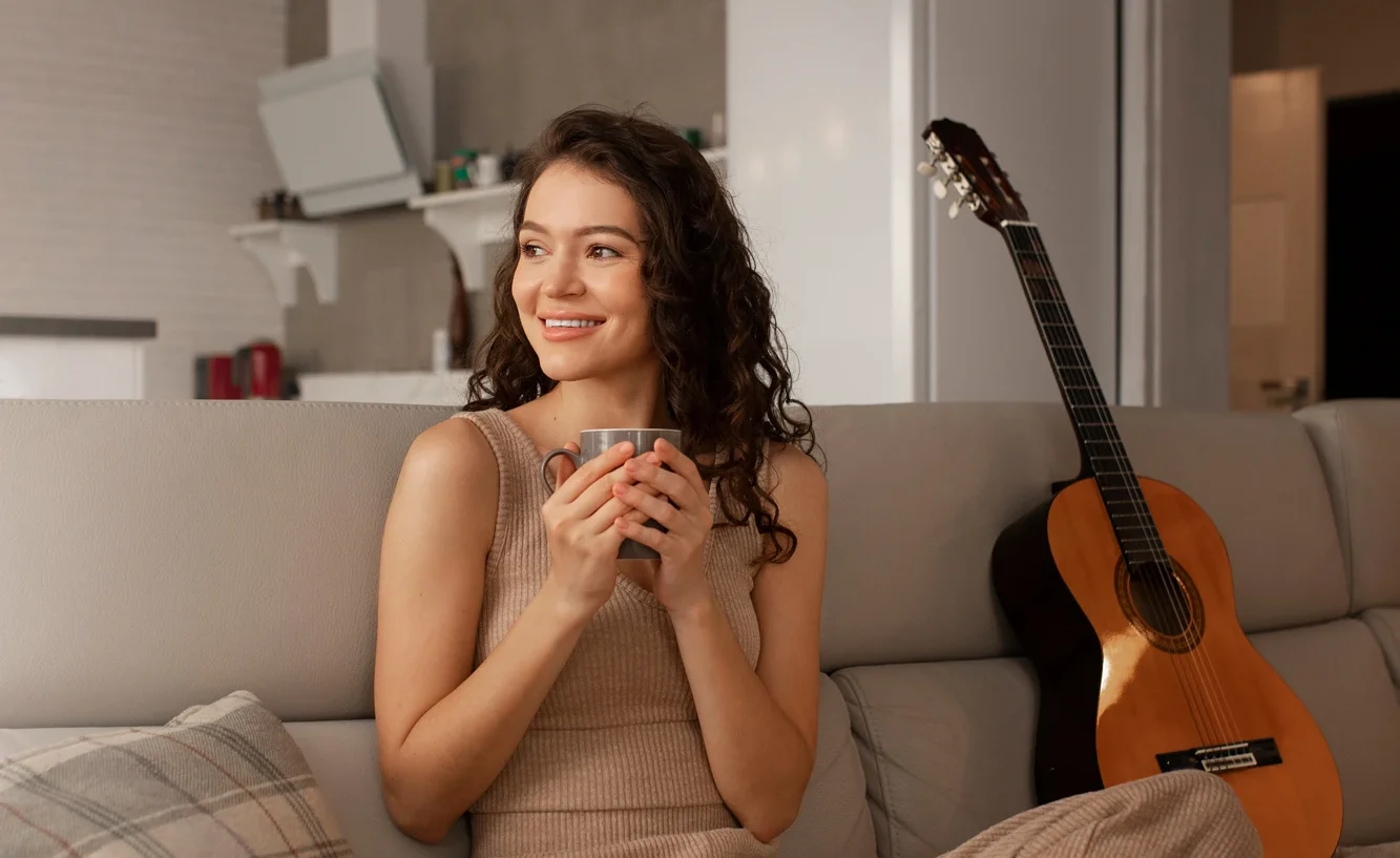 woman-digital-disconnecting-home-by-reading-book